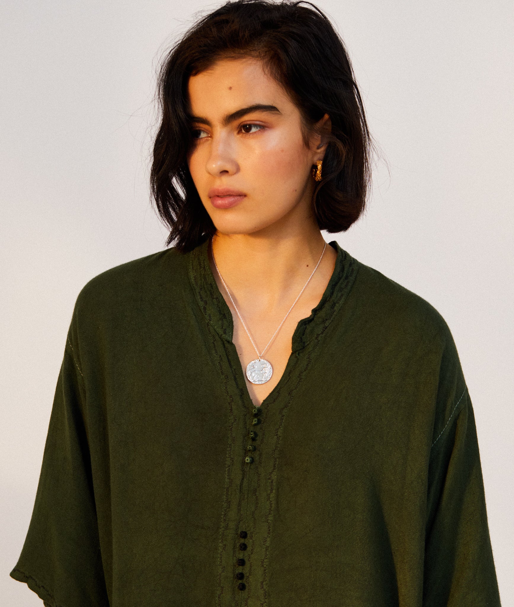 Model wearing Alighieri Silver Snow Lion Leone Medallion Necklace Venetian Coin
