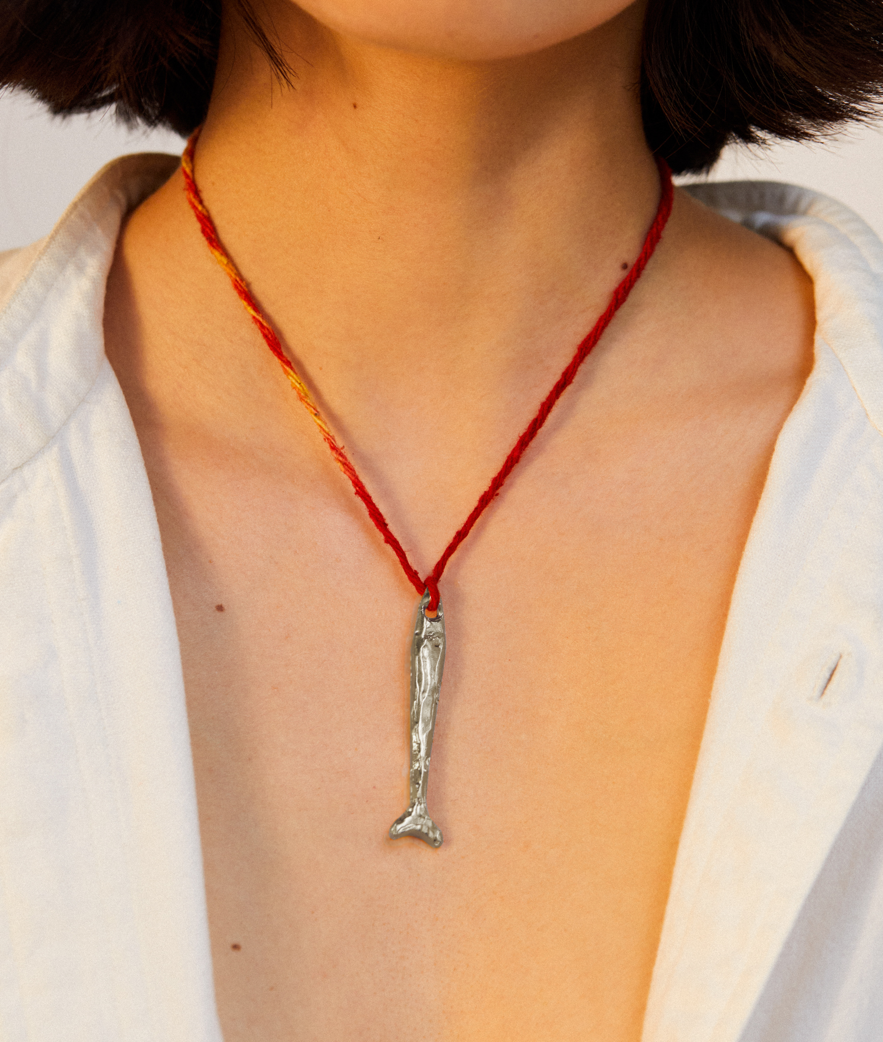 Model wearing Alighieri Silver necklace Catch of the Day 