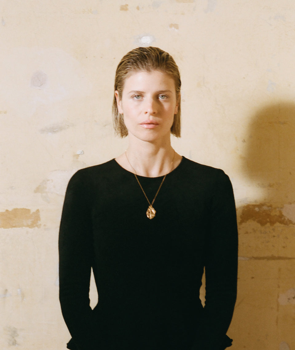 Model wearing Alighieri Gold Necklace The Cats Cradle 