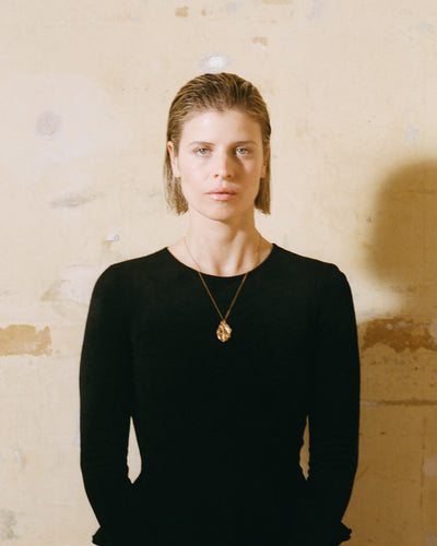 Model wearing Alighieri Gold Necklace The Cats Cradle 