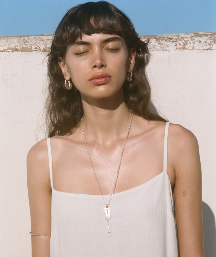 Model wearing Alighieri Silver Earrings Gilded Crustacean