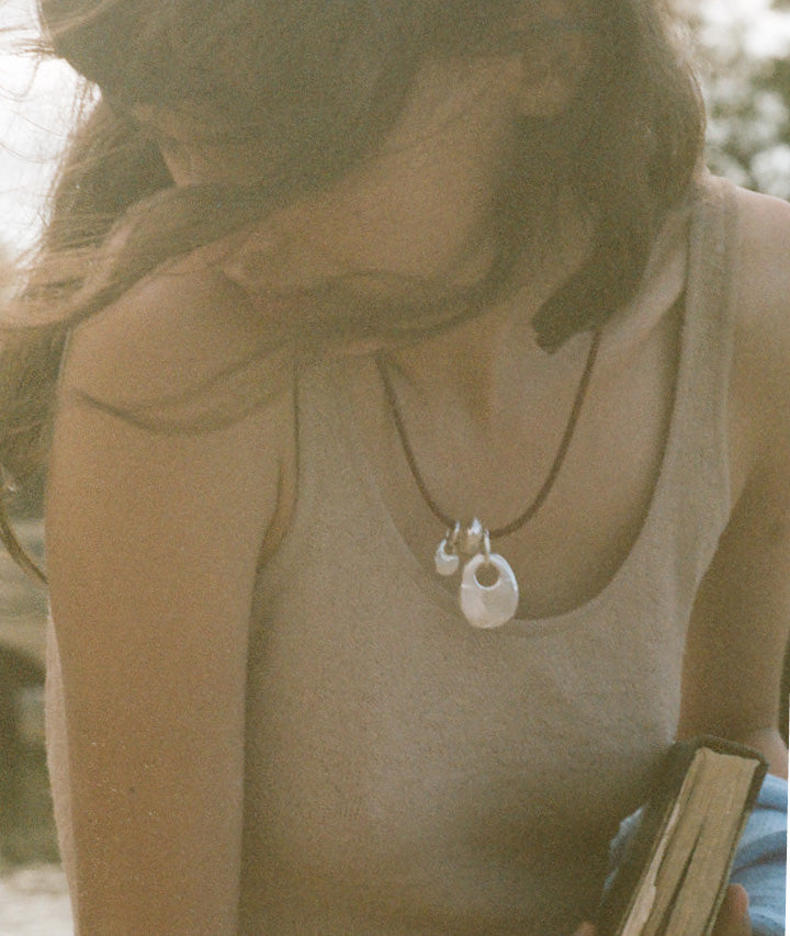 Model wearing Alighieri Silver Choker Reader on the Shore