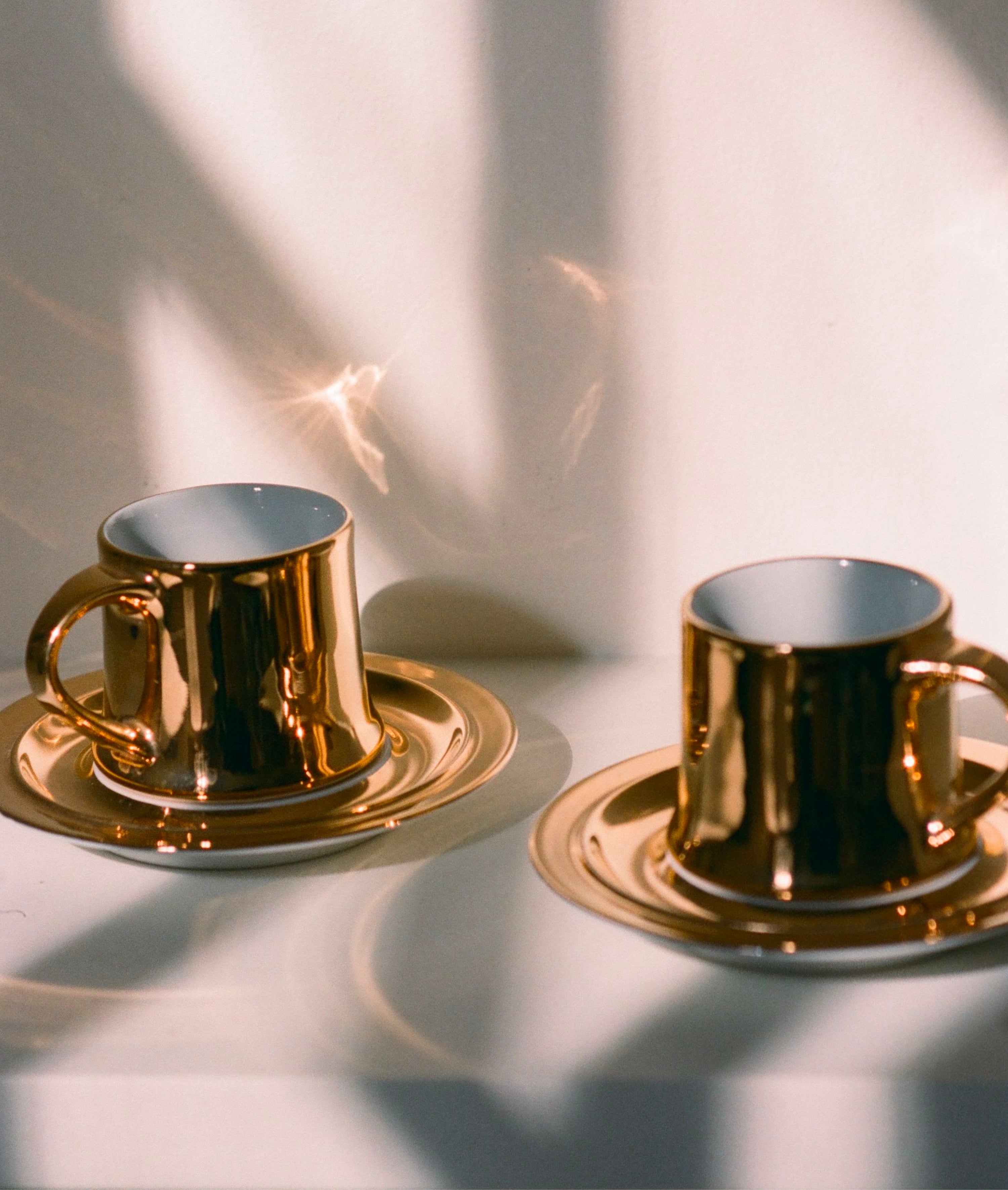 Pair of Gilded Cups and Saucers