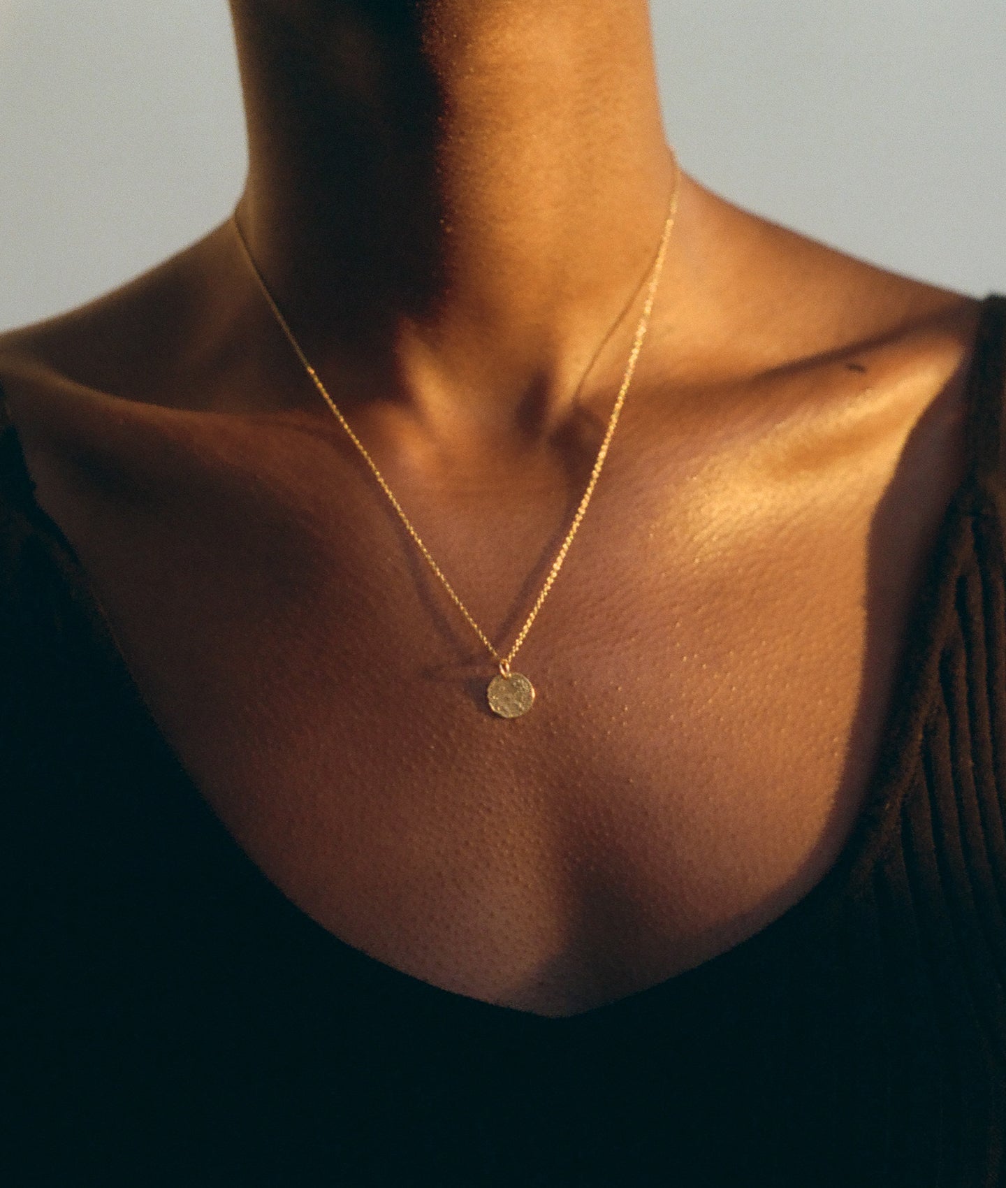 Model wearing Alighieri Baby Lion Cub Leone Necklace