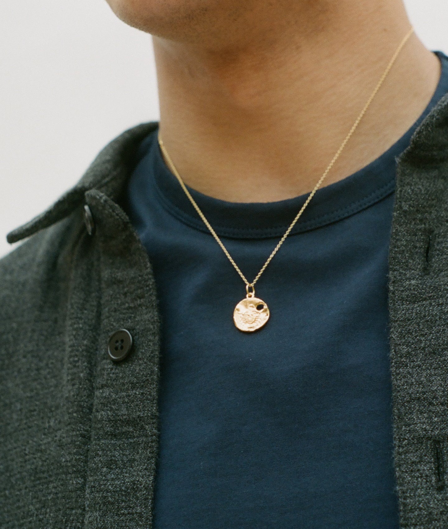 Model wearing Alighieri Cancer Zodiac Necklace Medallion