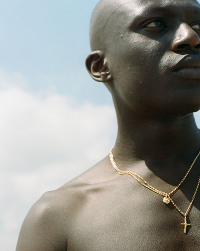 model wearing alighieri men's jewellery cross talisman necklace chain