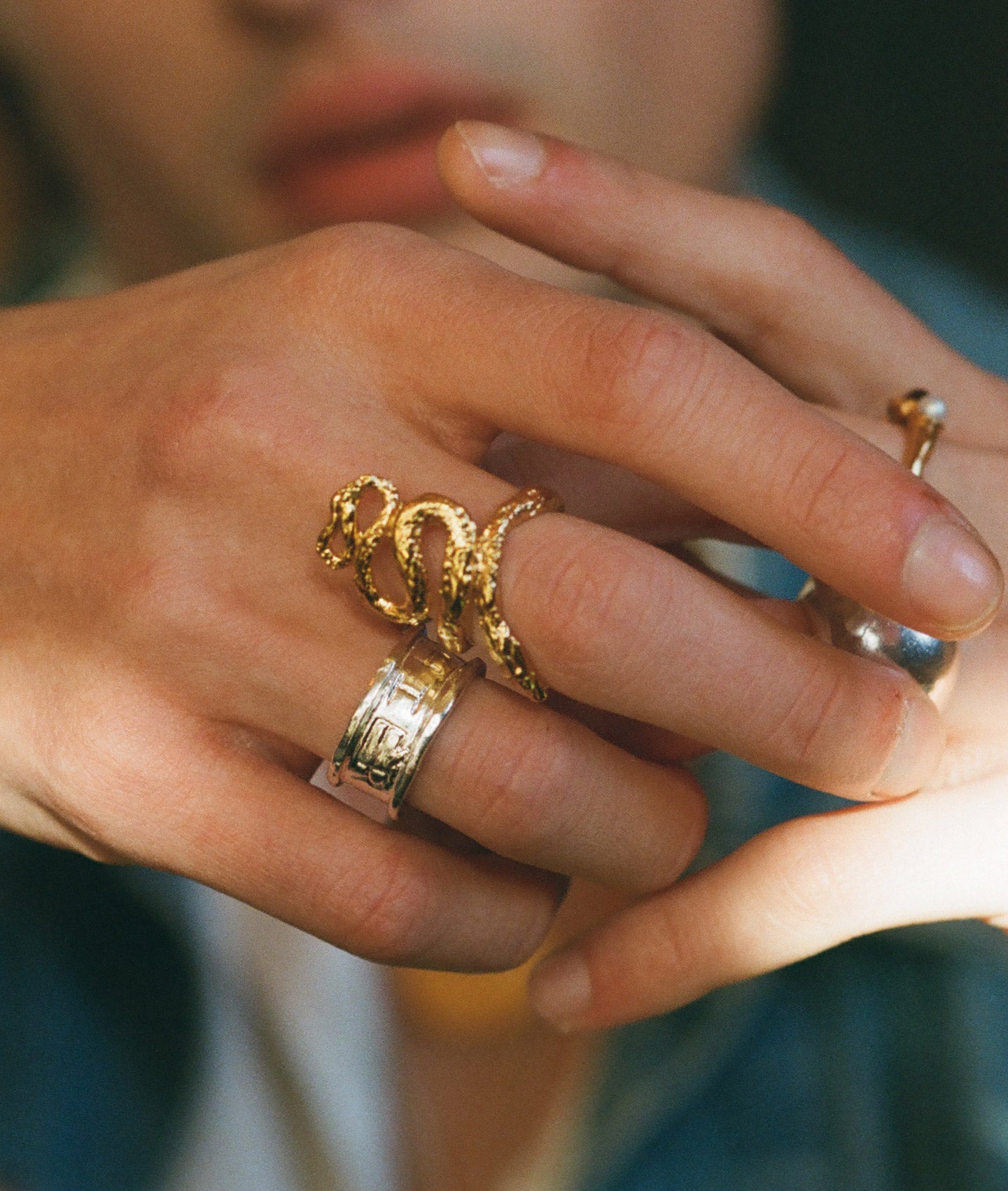 Alighieri medusa ring coiled snake gold statement ring model wearing hand